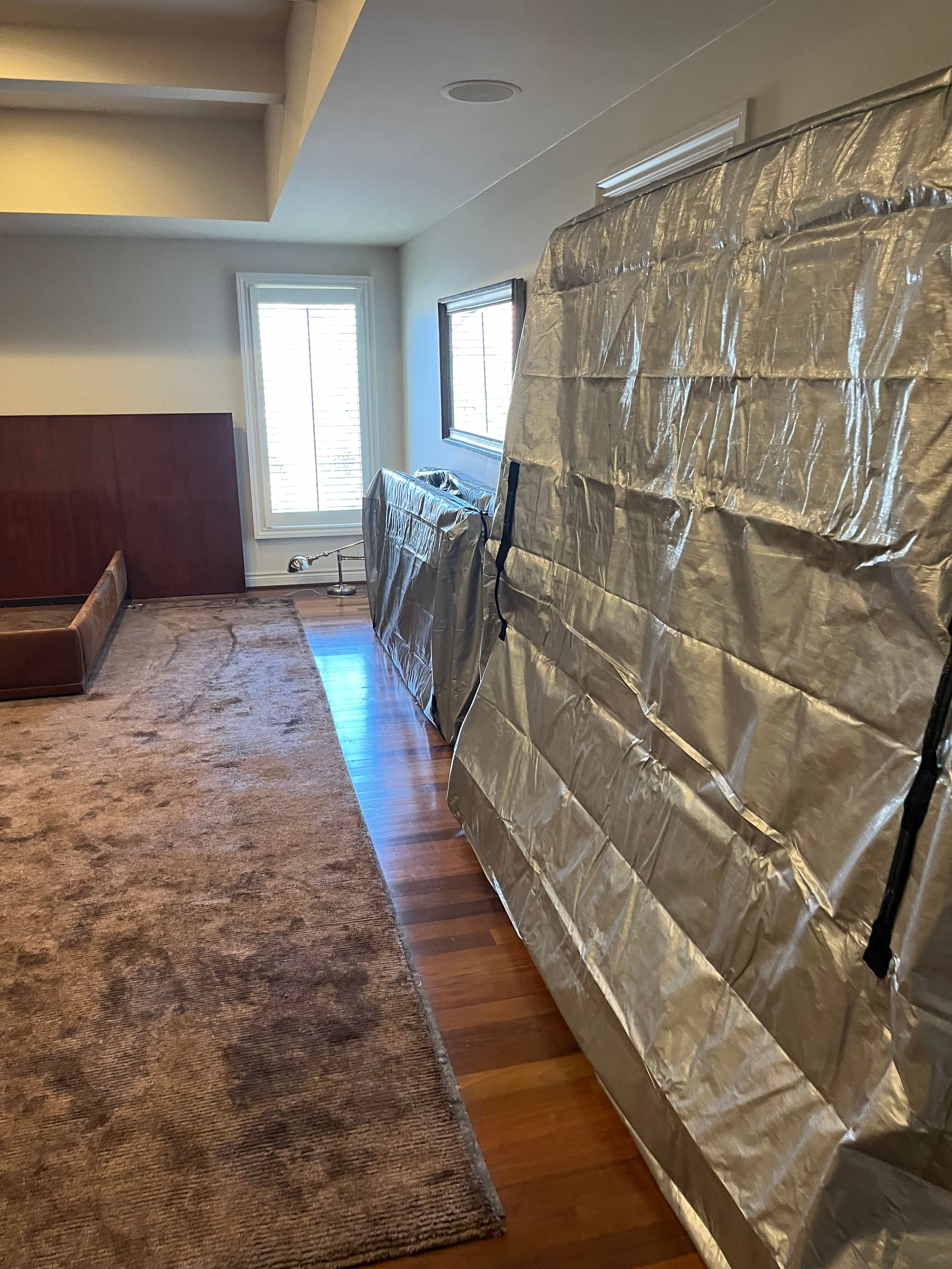 Room protected with moving blankets during a residential move